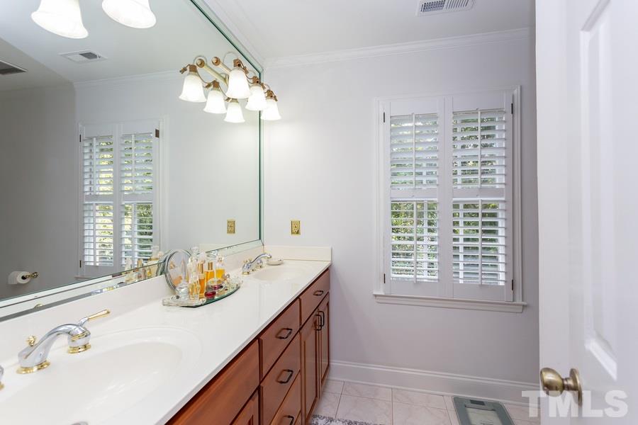 8609 Seagate Drive Raleigh, NC 27615 - Photo 15 of 28 His and her sinks!