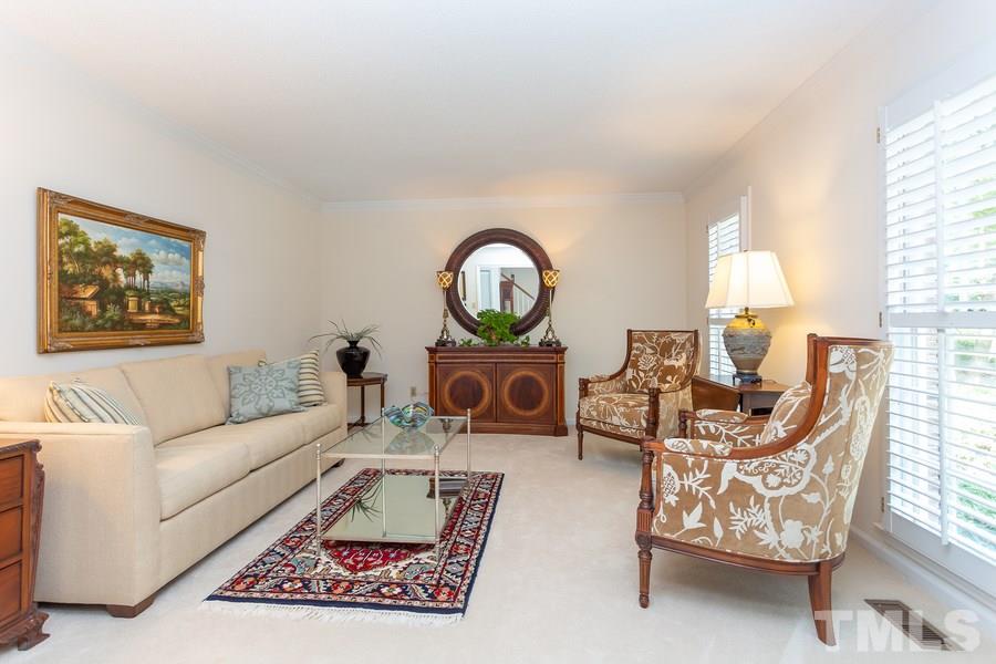 8609 Seagate Drive Raleigh, NC 27615 - Photo 5 of 28 This spacious room can be used for just about anything. Perfect for formal living, piano or cozy chats.