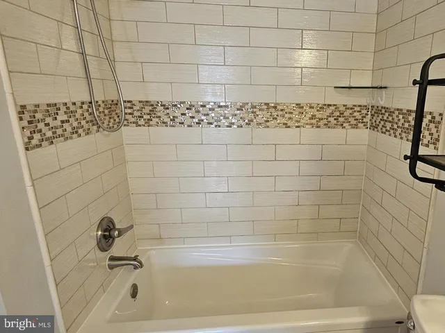 a bathroom with a bathtub