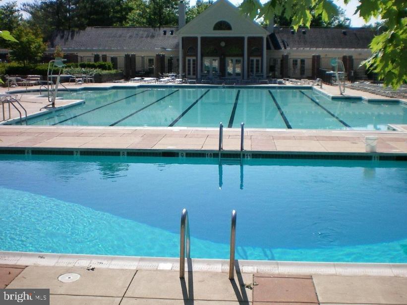 12012 Golf Ridge Court, Unit 102 Fairfax, VA 22033 - Photo 19 of 26 a view of a house with a yard