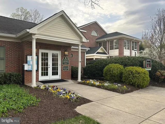 a view of a swimming pool with a yard