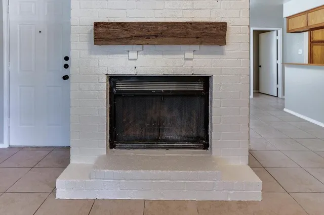a living room with a fireplace