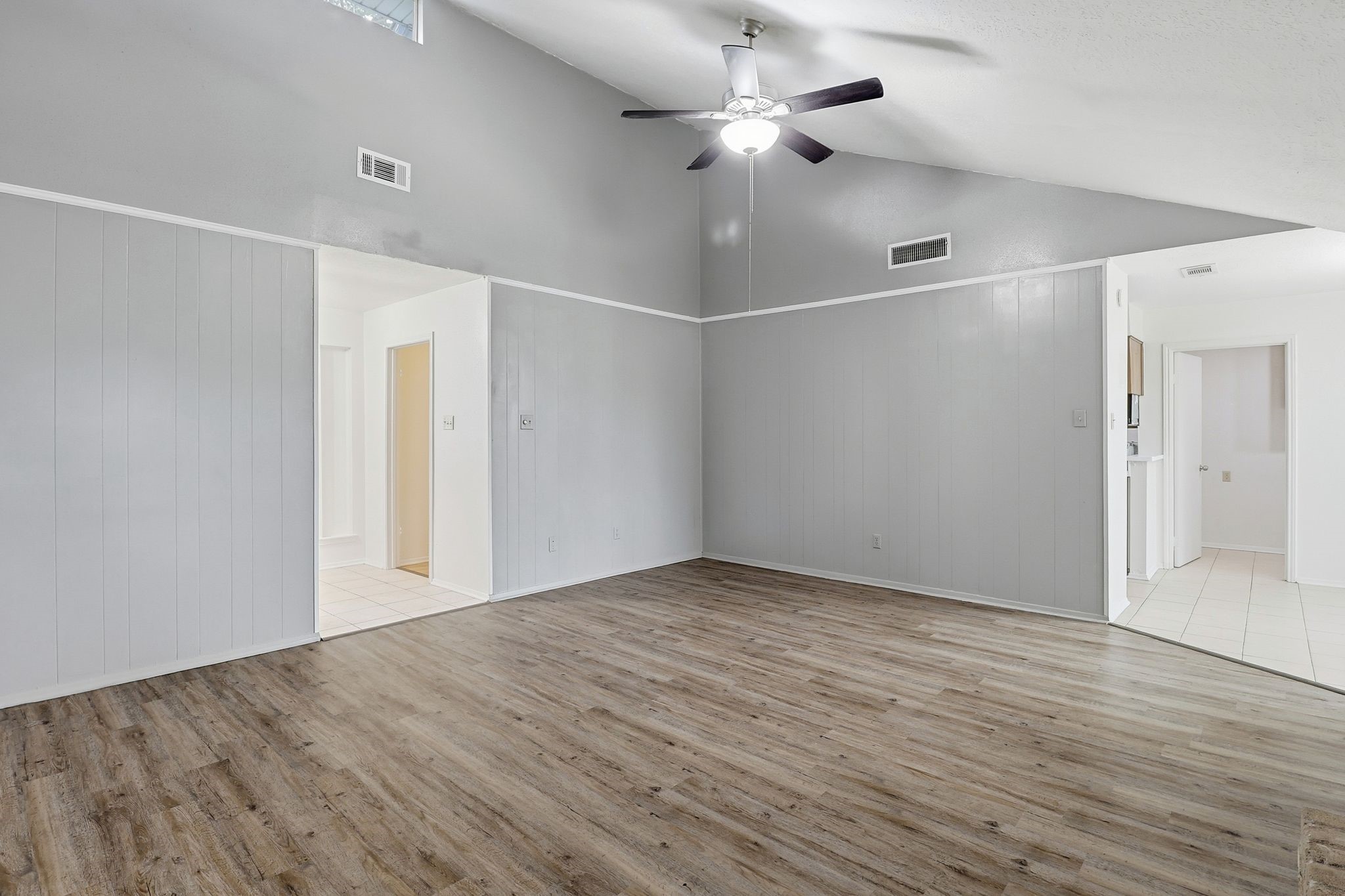 2000 Hamilton Street Rosenberg, TX 77471 - Photo 27 of 50 an empty room with wooden floor fan and windows