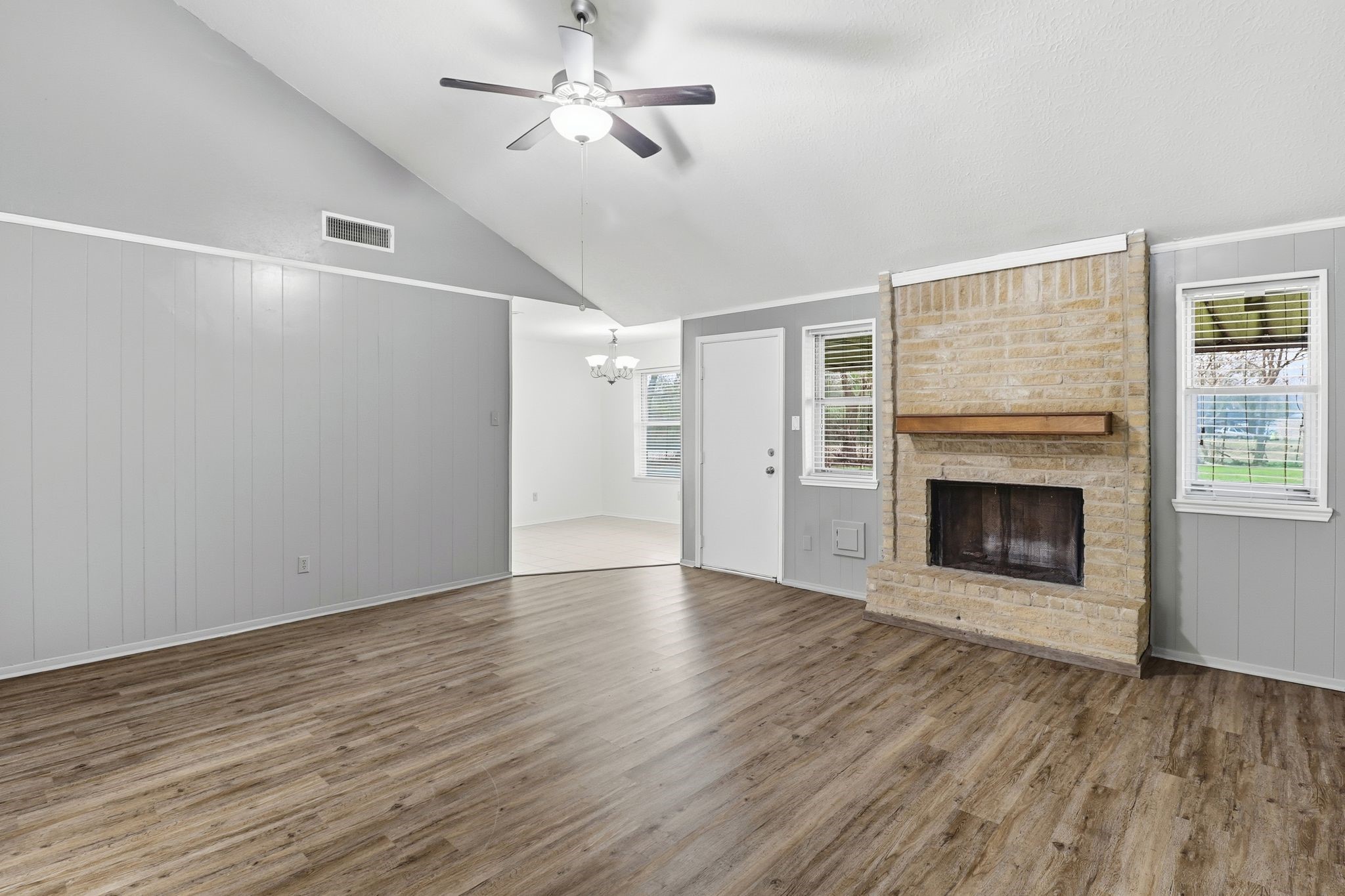 2000 Hamilton Street Rosenberg, TX 77471 - Photo 28 of 50 a view of an empty room with a fireplace and a window