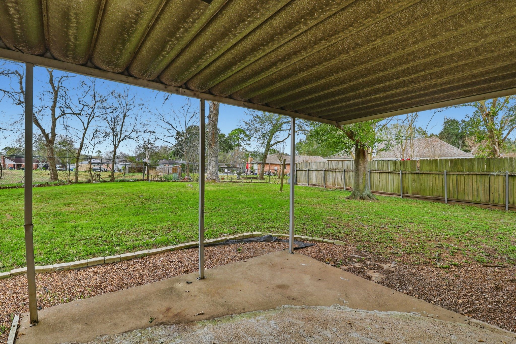 2000 Hamilton Street Rosenberg, TX 77471 - Photo 39 of 50 a view of a backyard with grass