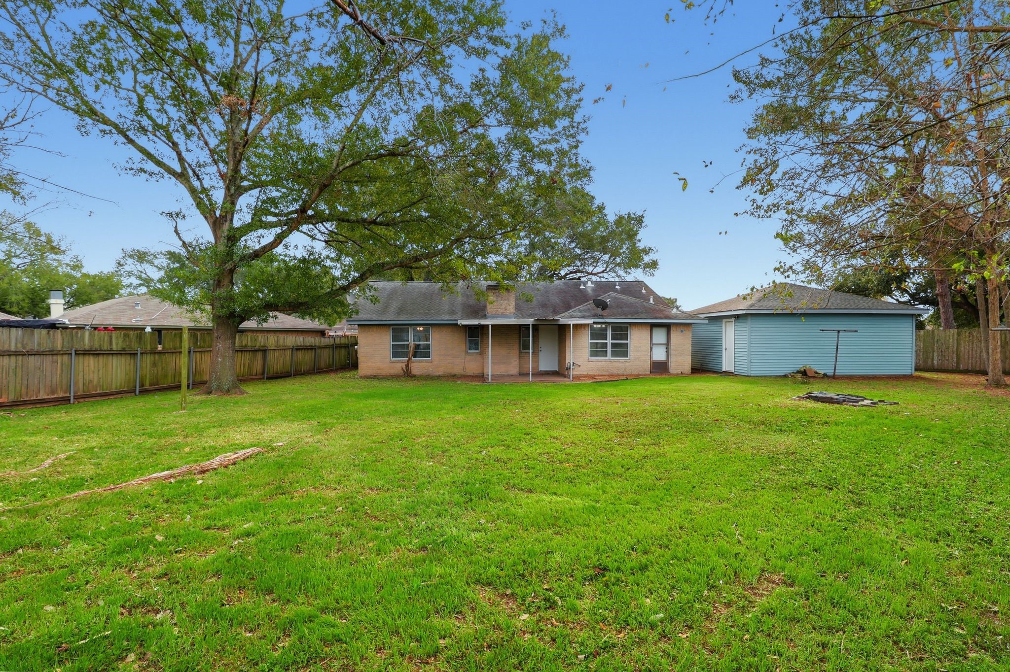 2000 Hamilton Street Rosenberg, TX 77471 - Photo 42 of 50 a view of a house with a yard and sitting area