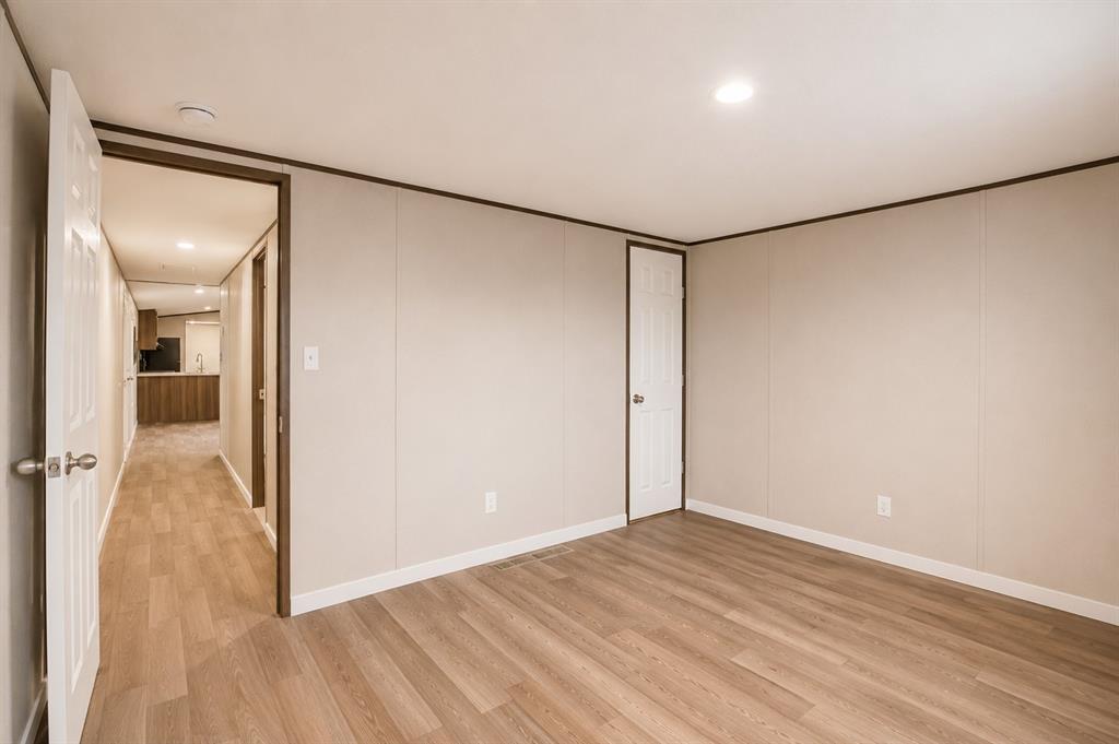 1206 Hayes Road Sherman, TX 75090 - Photo 16 of 21 a view of a room with wooden floor
