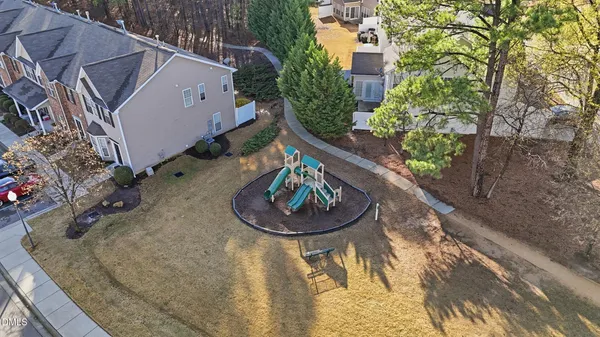a view of a balcony with two chairs and a table