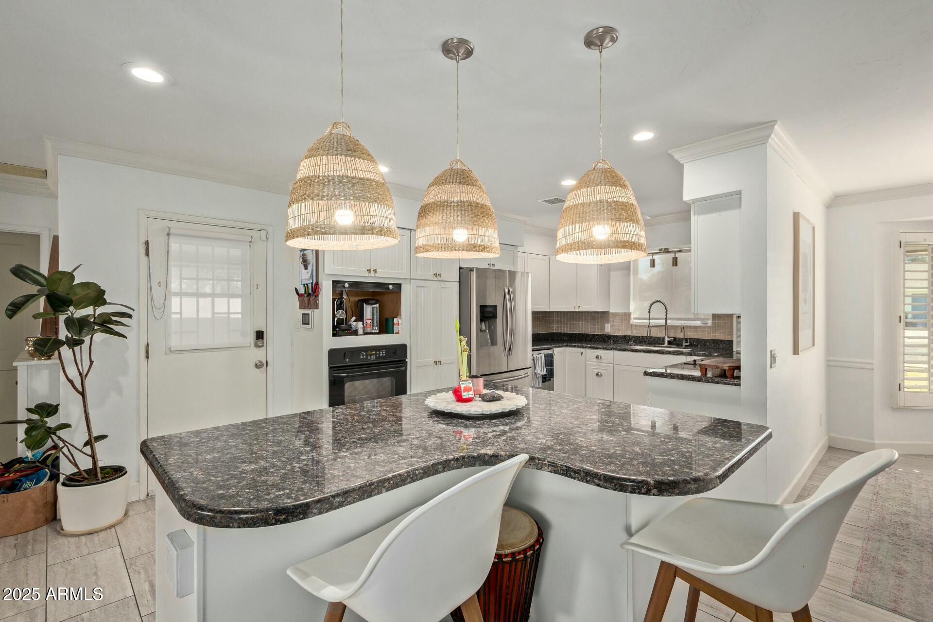 4718 North 35th Way Phoenix, AZ 85018 - Photo 3 of 20 Kitchen Island