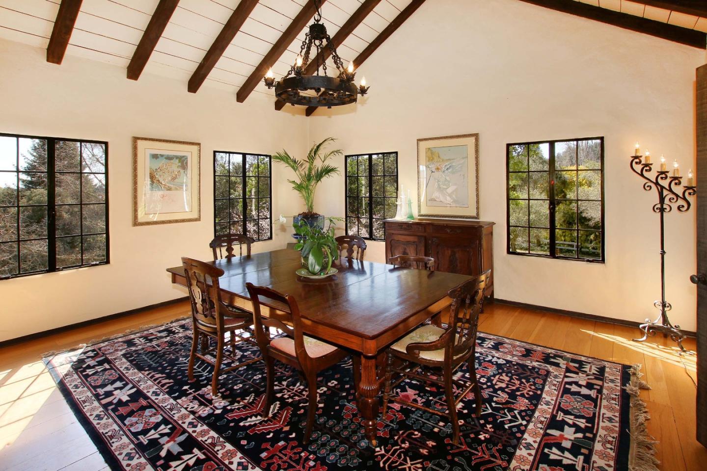 401 Eagle Ridge Corralitos, CA 95076 - Photo 8 of 19 a view of a dining room with furniture wooden floor and chandelier