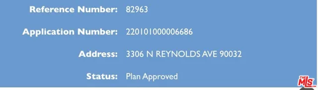 a view of a palm tree front yard