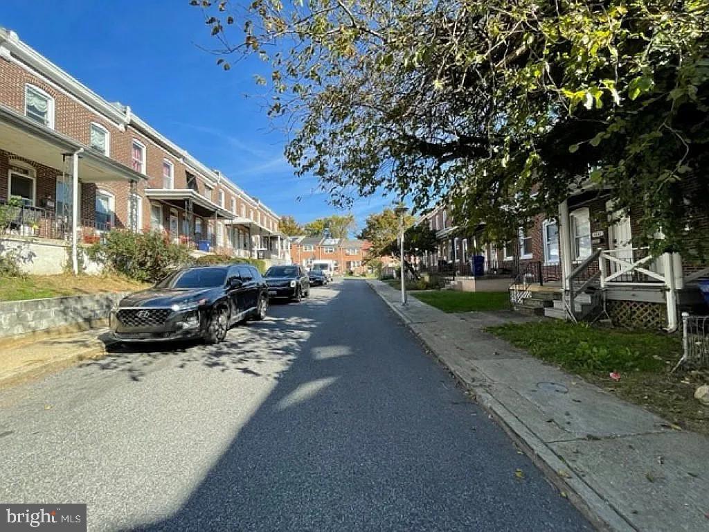 3041 Mathews Street Baltimore, MD 21218 - Photo 11 of 12 Charming street lined with homes.