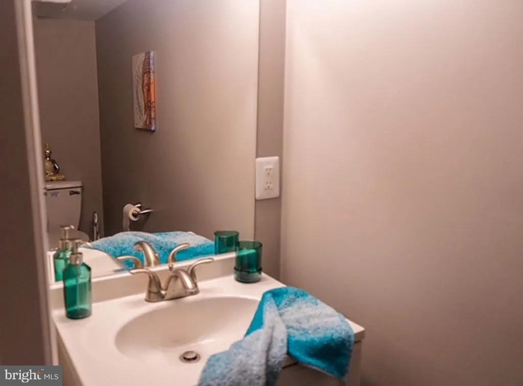 3041 Mathews Street Baltimore, MD 21218 - Photo 9 of 12 Chic bathroom with serene hues.