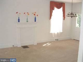 226 Chestnut Street Spring City, PA 19475 - Photo 3 of 6 an empty room with a window