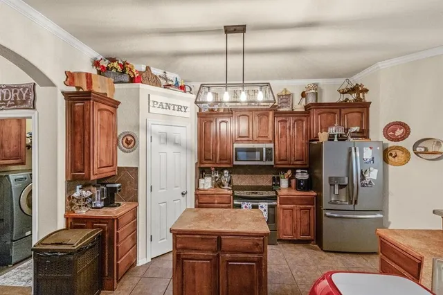 $409,000 | 9430 West Highway 199, Poolville, TX 76487