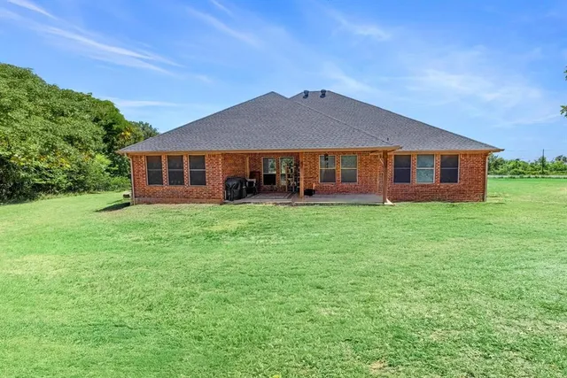 $409,000 | 9430 West Highway 199, Poolville, TX 76487