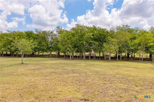 an outdoor space with patio area