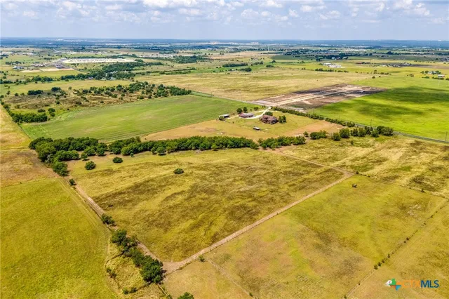 a view of swimming pool from a yard