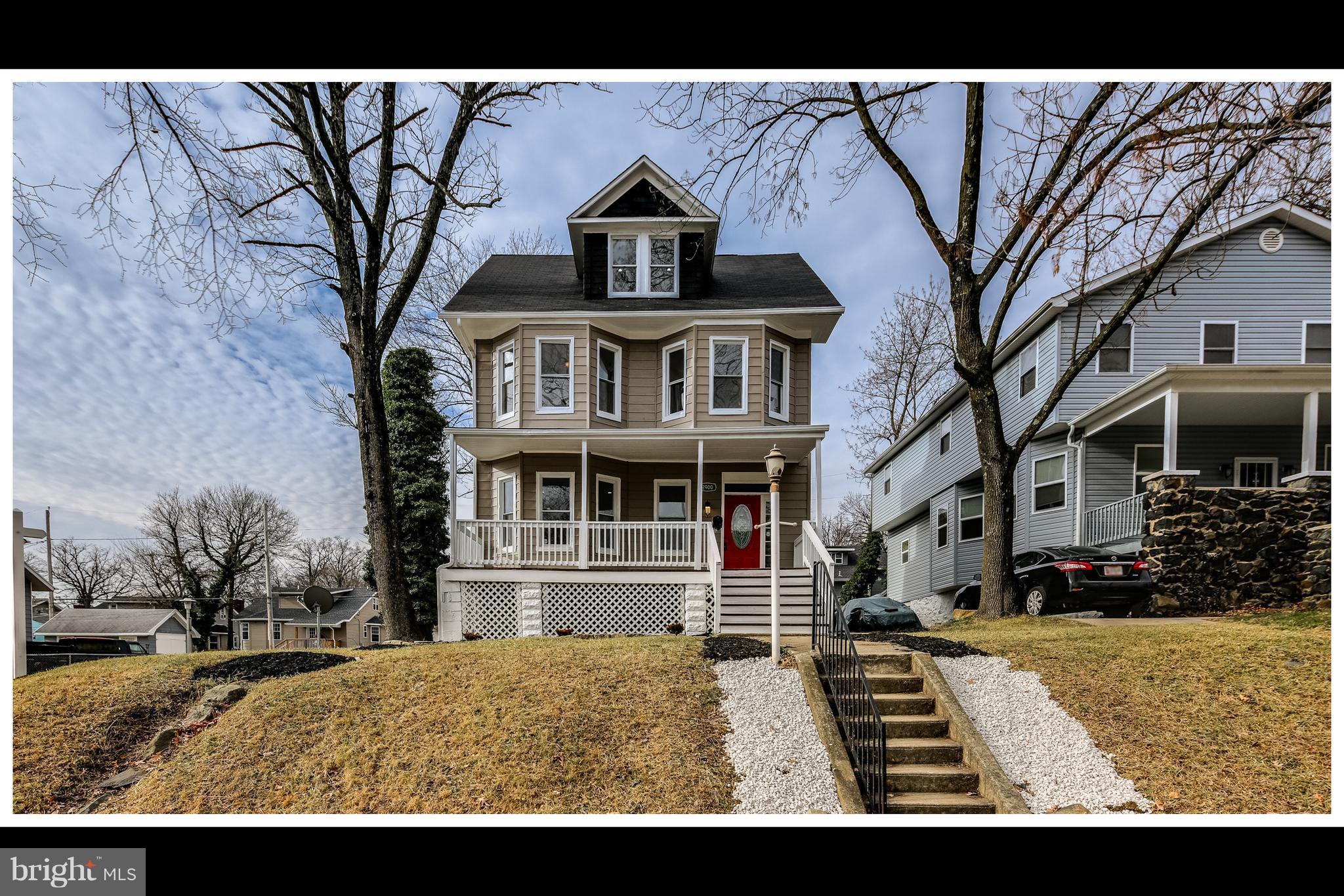 2900 Allendale Road Baltimore, MD 21216 - Photo 2 of 29 a front view of a house with a yard