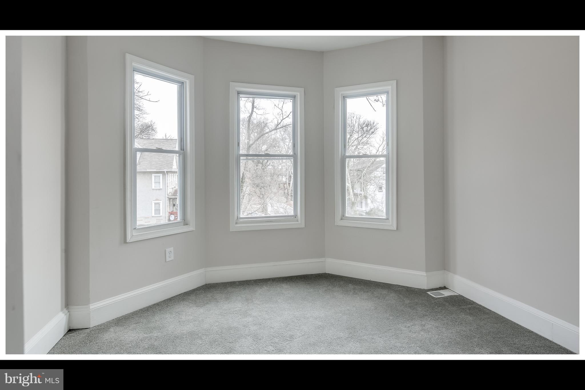 2900 Allendale Road Baltimore, MD 21216 - Photo 16 of 29 a view of an empty room with a window