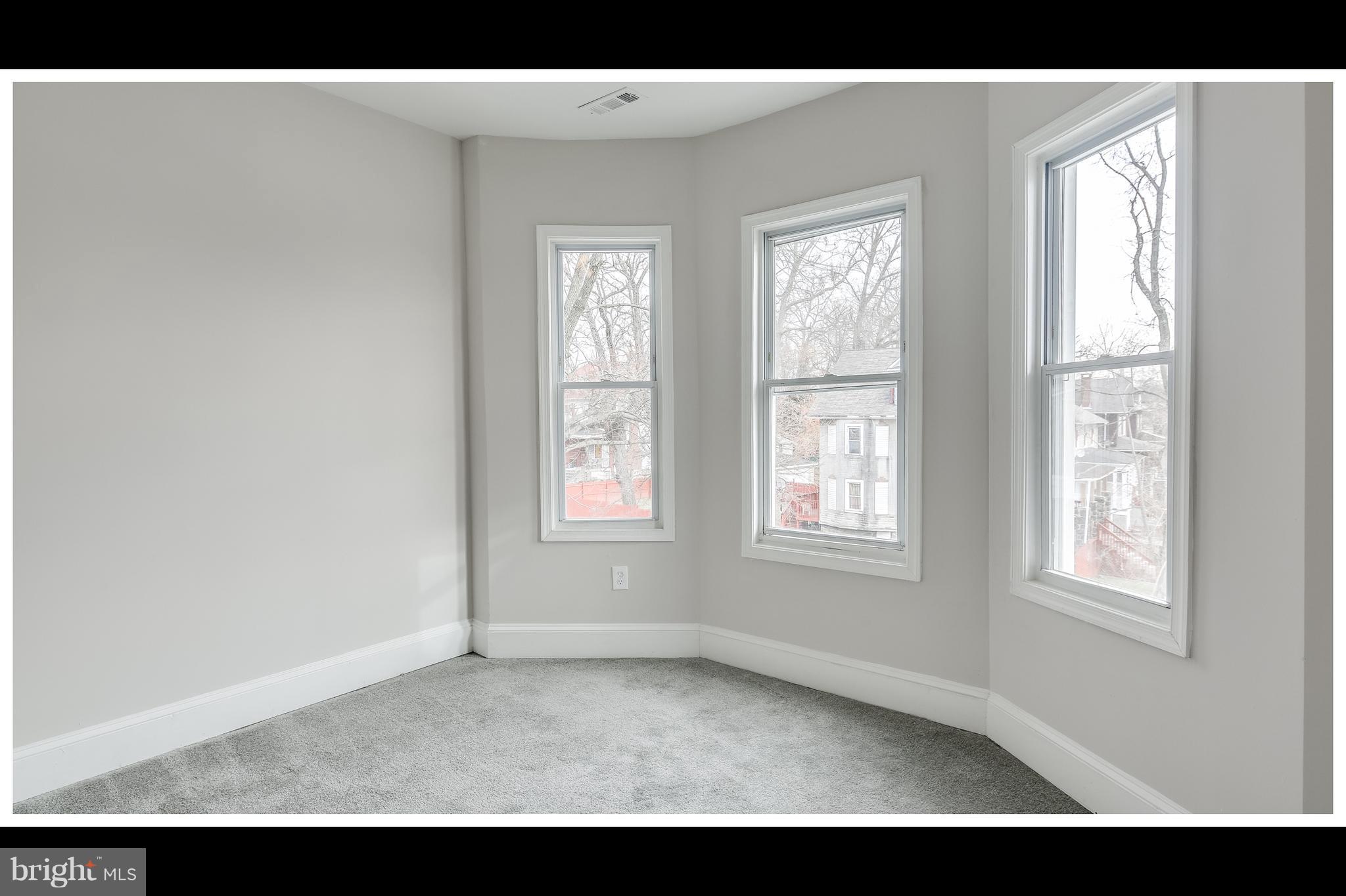2900 Allendale Road Baltimore, MD 21216 - Photo 17 of 29 a view of an empty room with a window