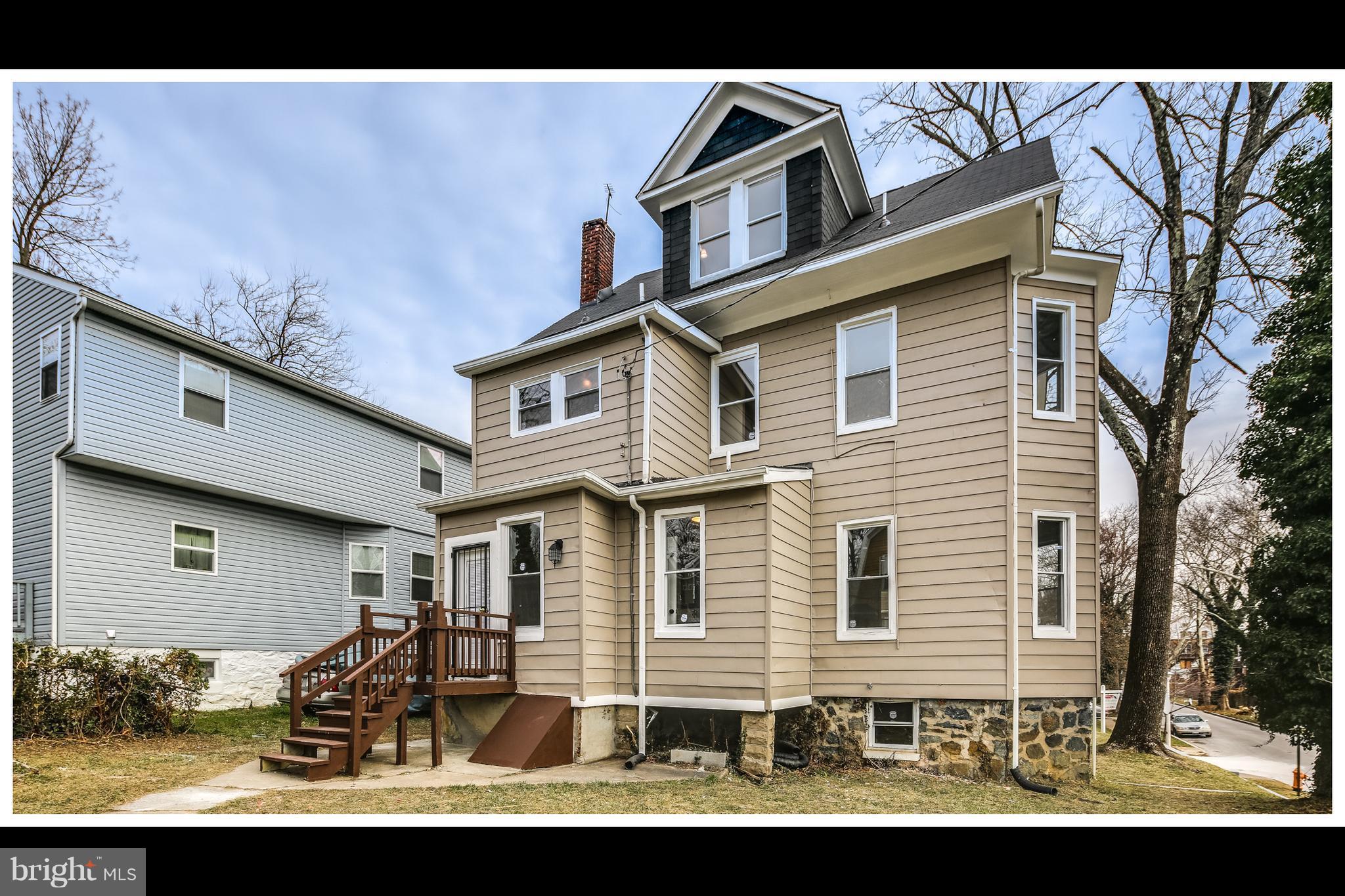 2900 Allendale Road Baltimore, MD 21216 - Photo 29 of 29 a front view of a house with a yard