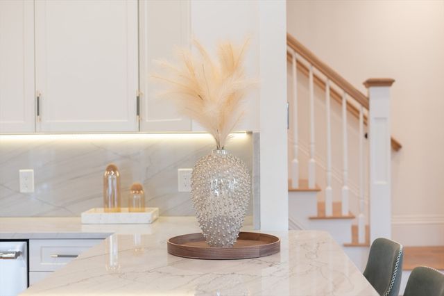 a view of kitchen with window and seating