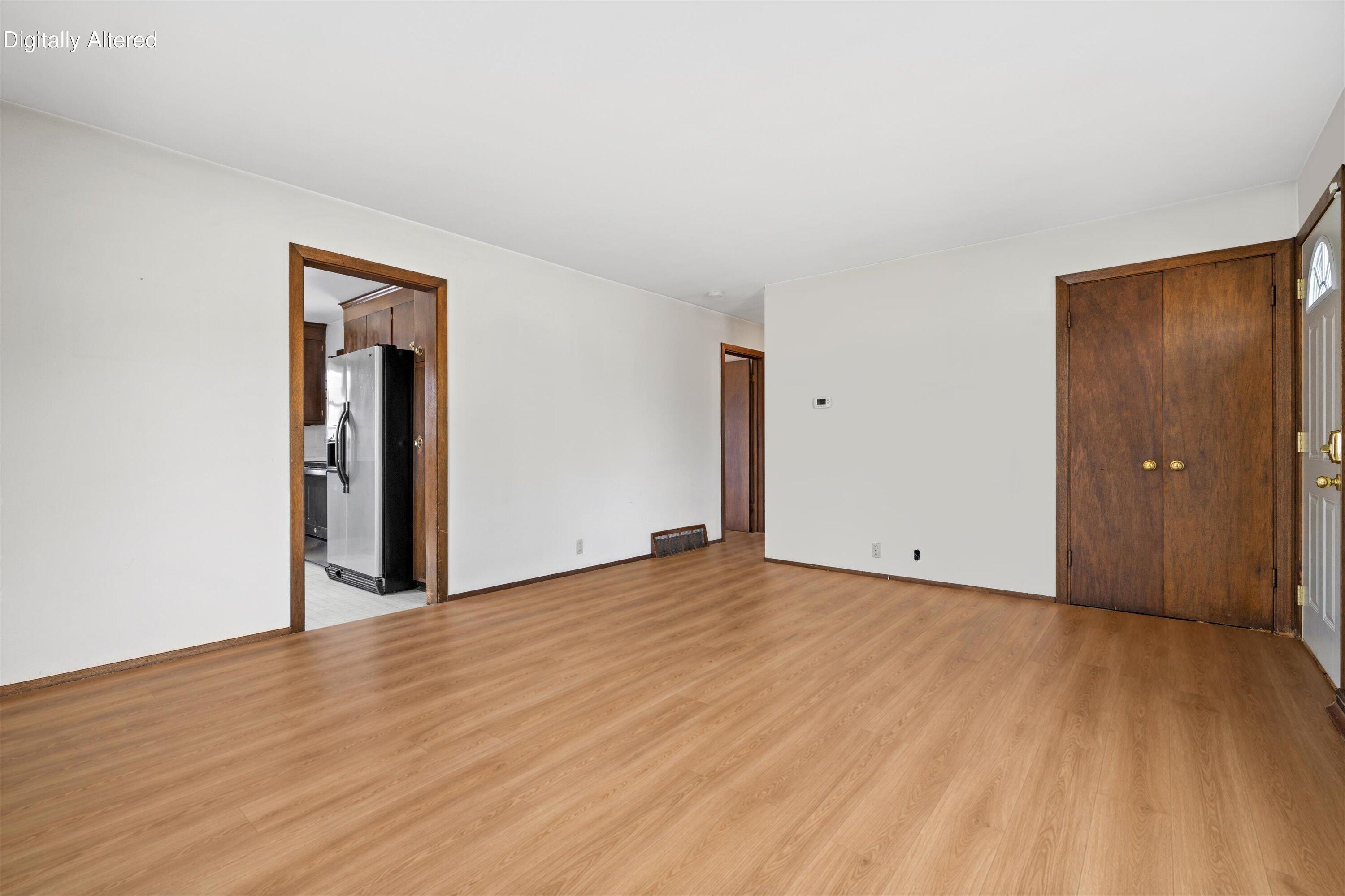 Photos are Digitally Altered to show different flooring in living room