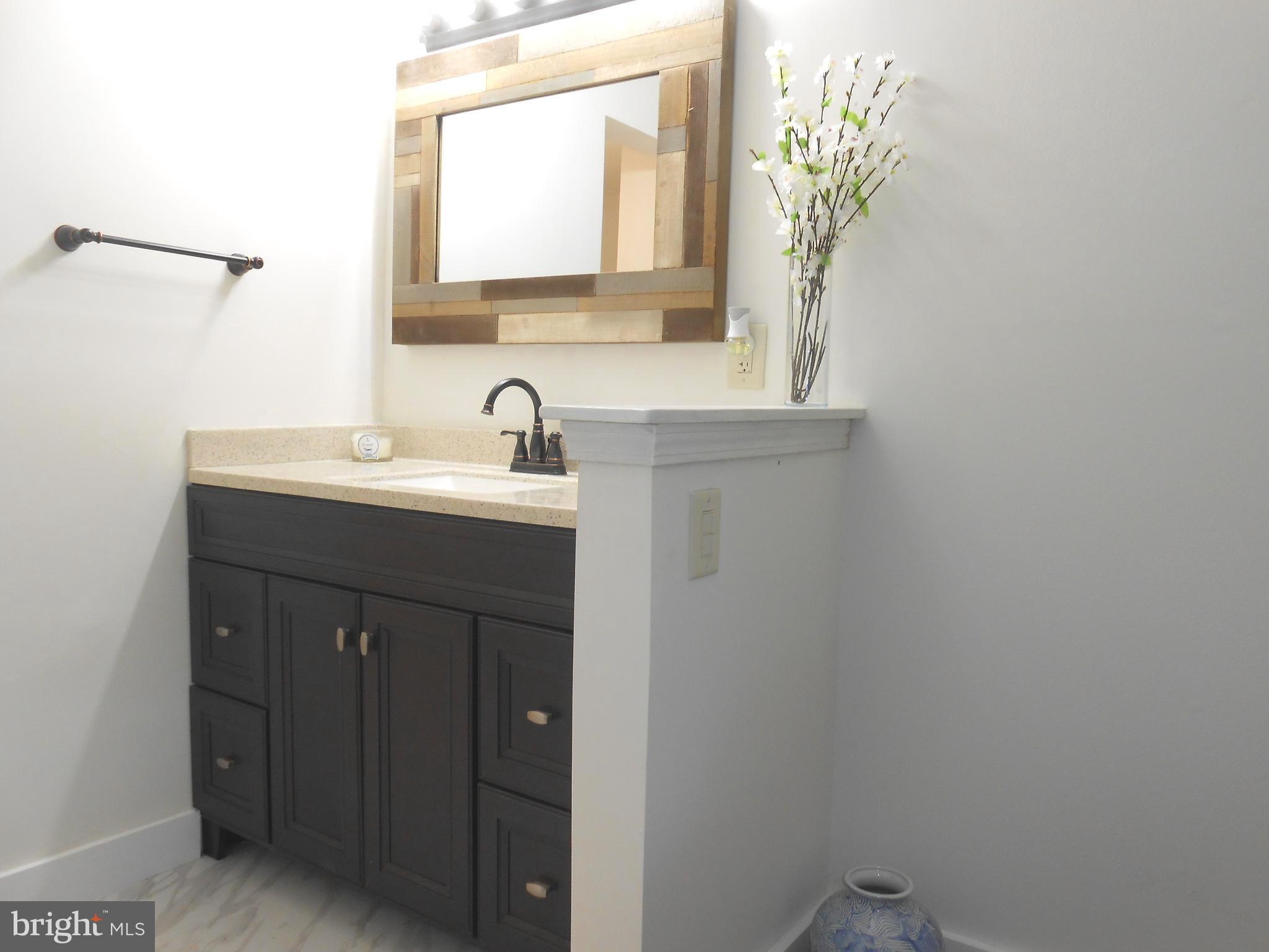 116 Cross Keys Road, Unit R116F Baltimore, MD 21210 - Photo 15 of 26 New master bath-marble tile floors