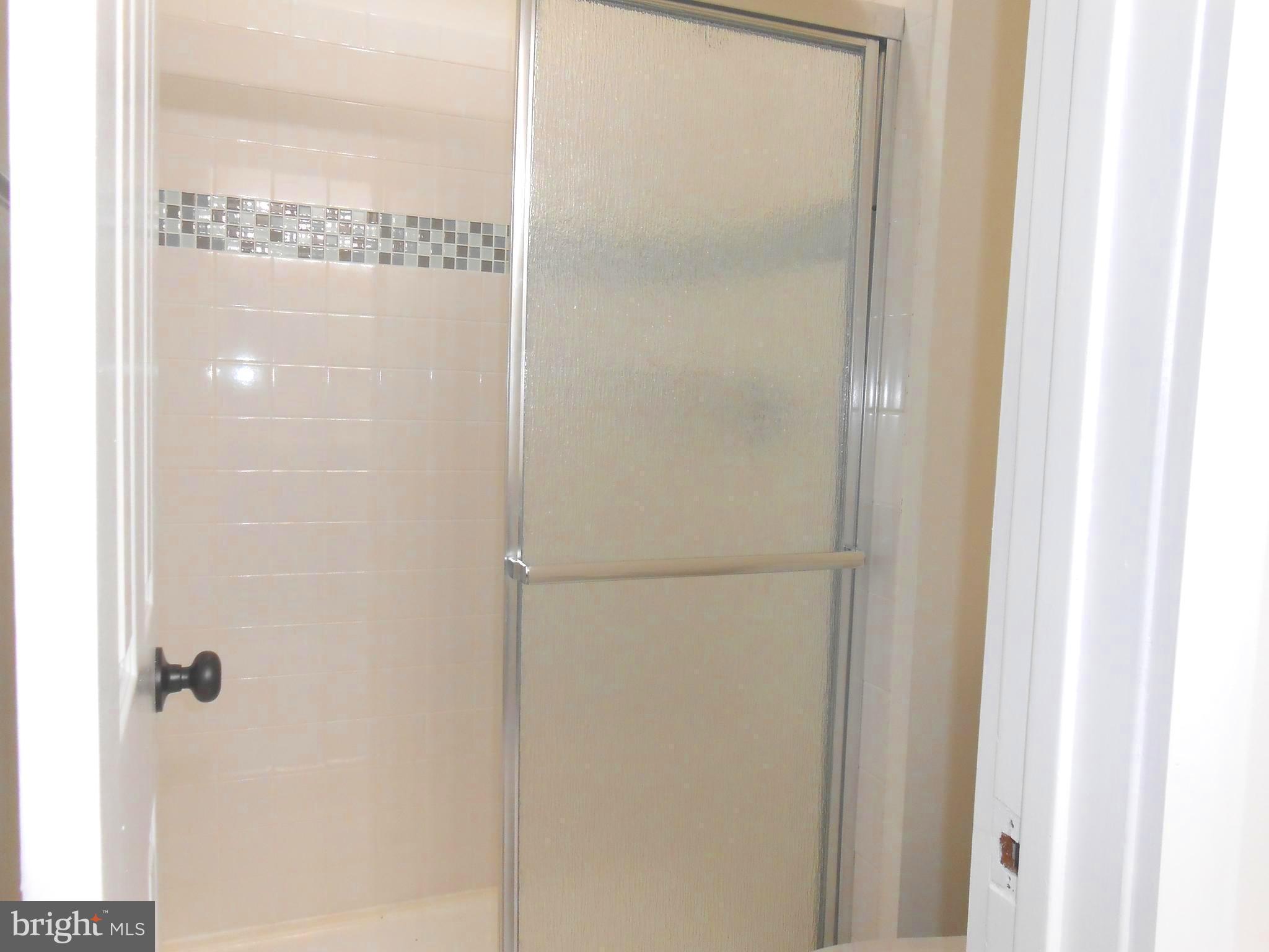 116 Cross Keys Road, Unit R116F Baltimore, MD 21210 - Photo 16 of 26 Stand up shower- . new tile work.