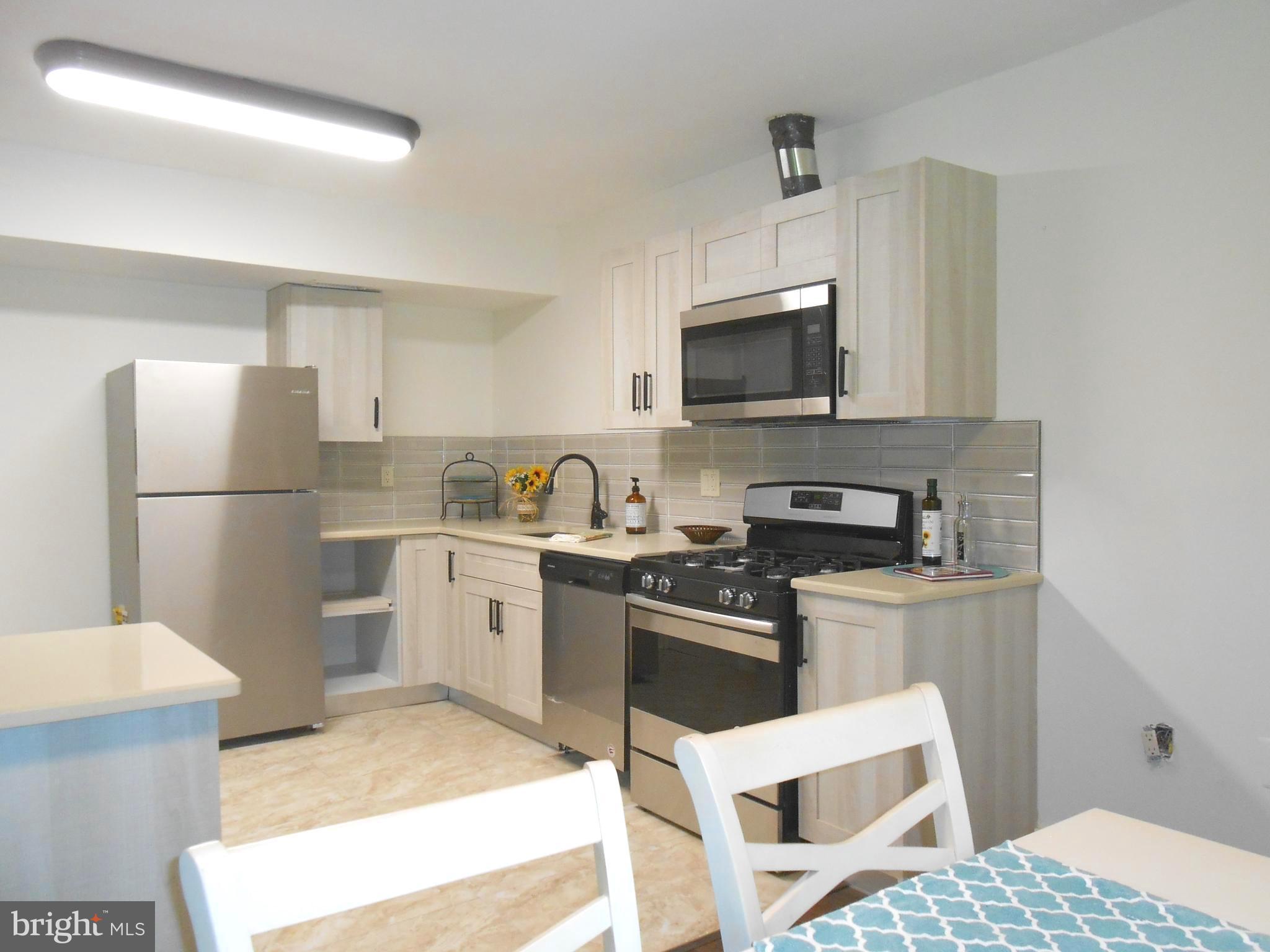 116 Cross Keys Road, Unit R116F Baltimore, MD 21210 - Photo 6 of 26 Spacious and open kitchen /dining combo.