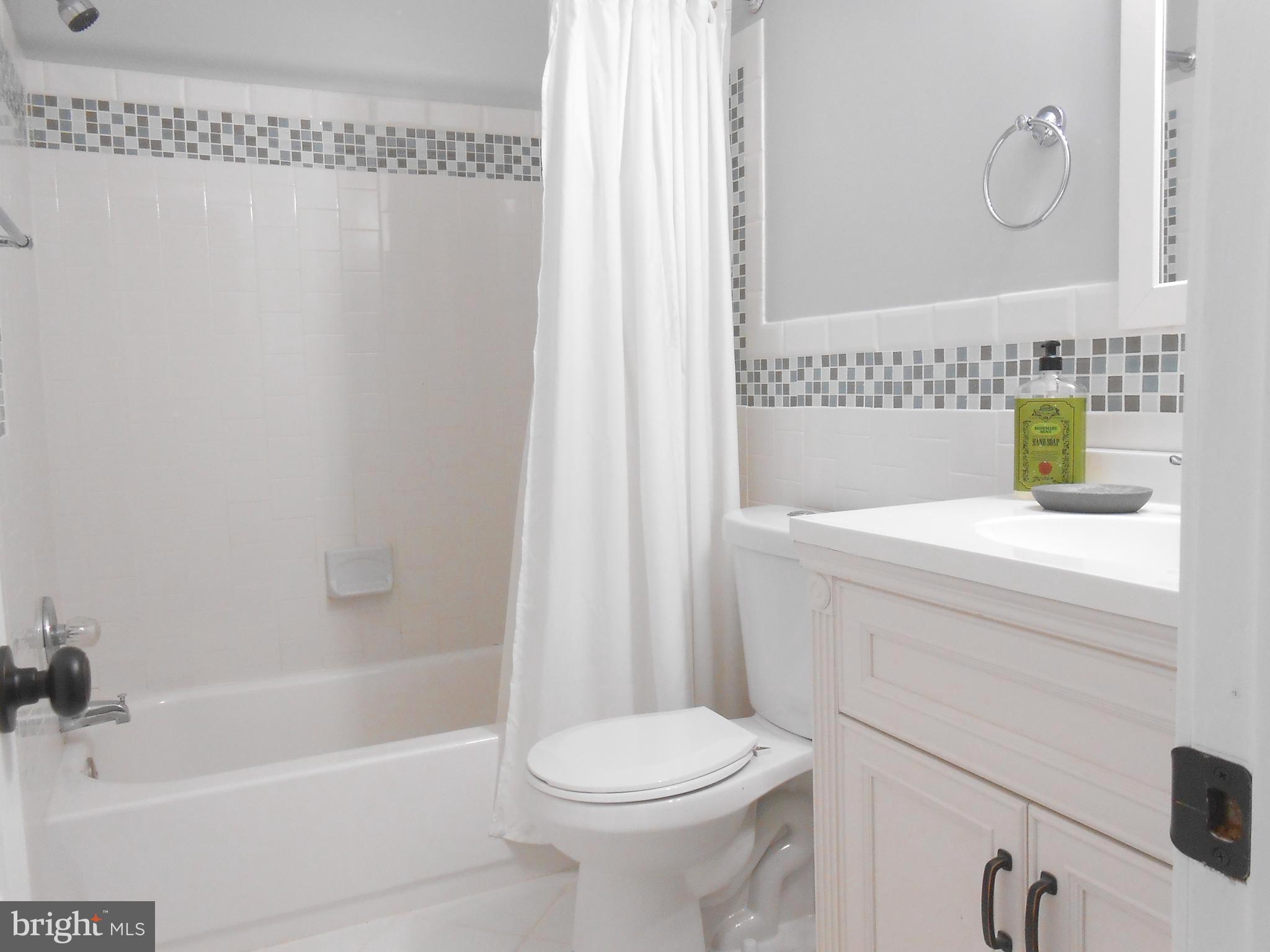 116 Cross Keys Road, Unit R116F Baltimore, MD 21210 - Photo 8 of 26 Renovated Full Bathroom Bathroom