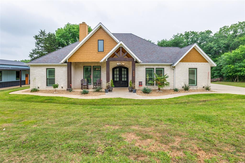 586 Rustic Oaks Road Combine, TX 75159 - Photo 2 of 39 Landscaped and front features 12x12 posts