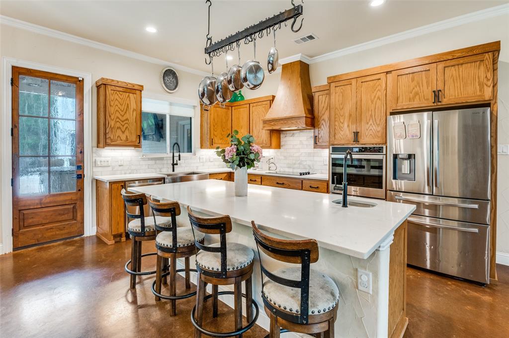 586 Rustic Oaks Road Combine, TX 75159 - Photo 7 of 39 Large island makes breakfast easy