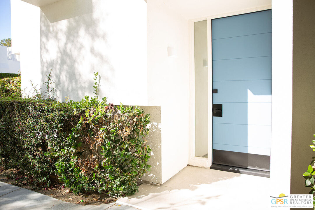48940 Desert Flower Drive Palm Desert, CA 92260 - Photo 27 of 31 a view of a wooden door