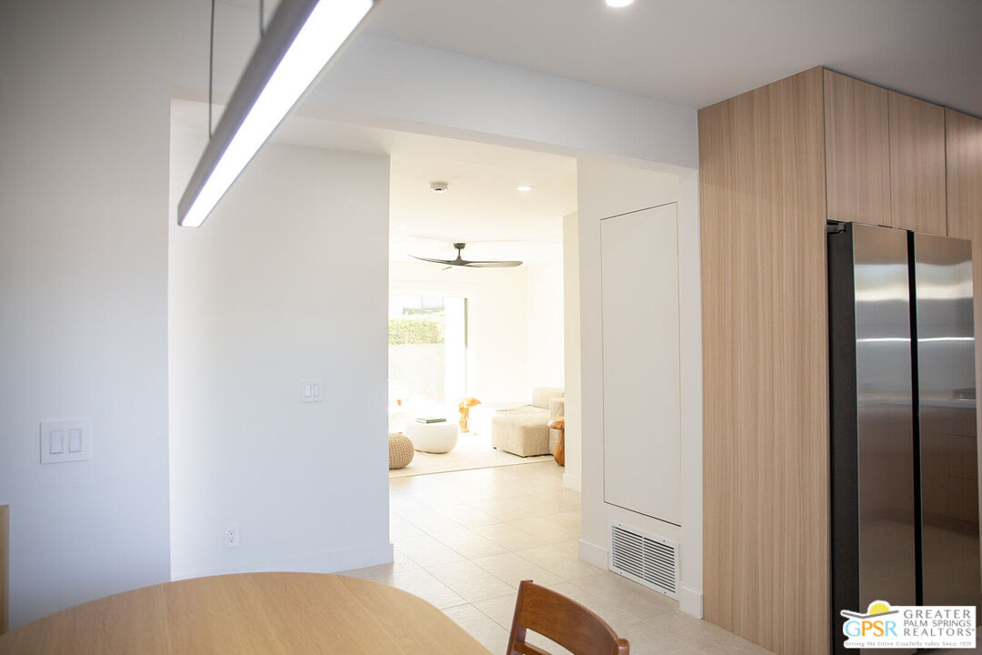 48940 Desert Flower Drive Palm Desert, CA 92260 - Photo 6 of 31 a view of kitchen and living room