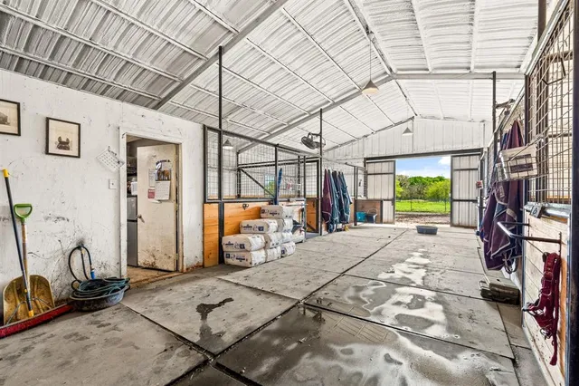 a view of a house with pool and chairs