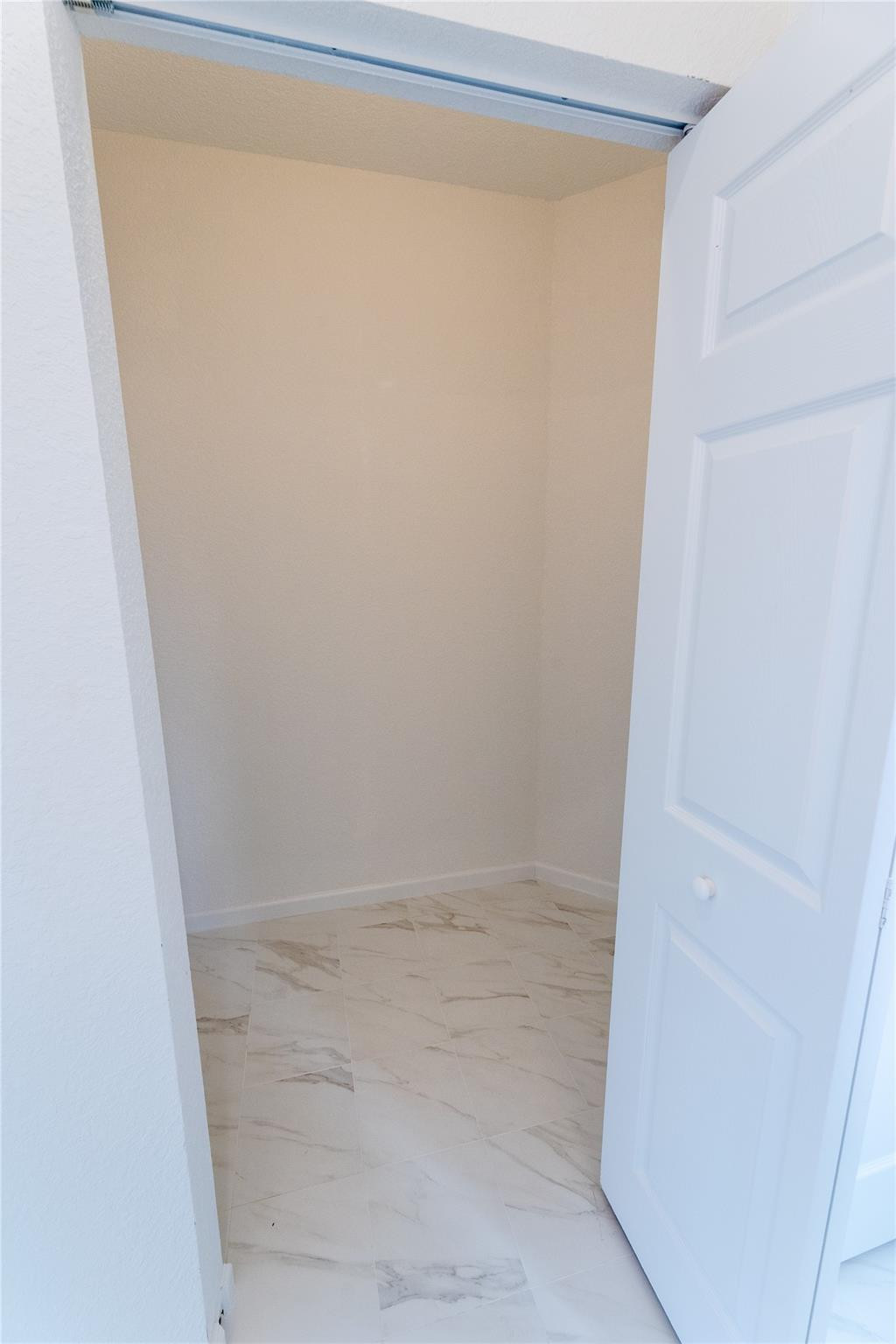 3199 Laurel Ridge Circle, Unit 3199 Riviera Beach, FL 33404 - Photo 28 of 44 a view of closet