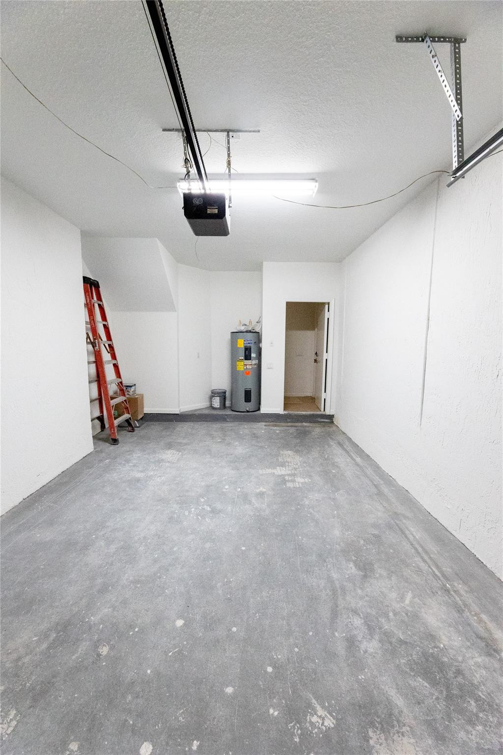 3199 Laurel Ridge Circle, Unit 3199 Riviera Beach, FL 33404 - Photo 32 of 44 an empty room with stairs and white walls