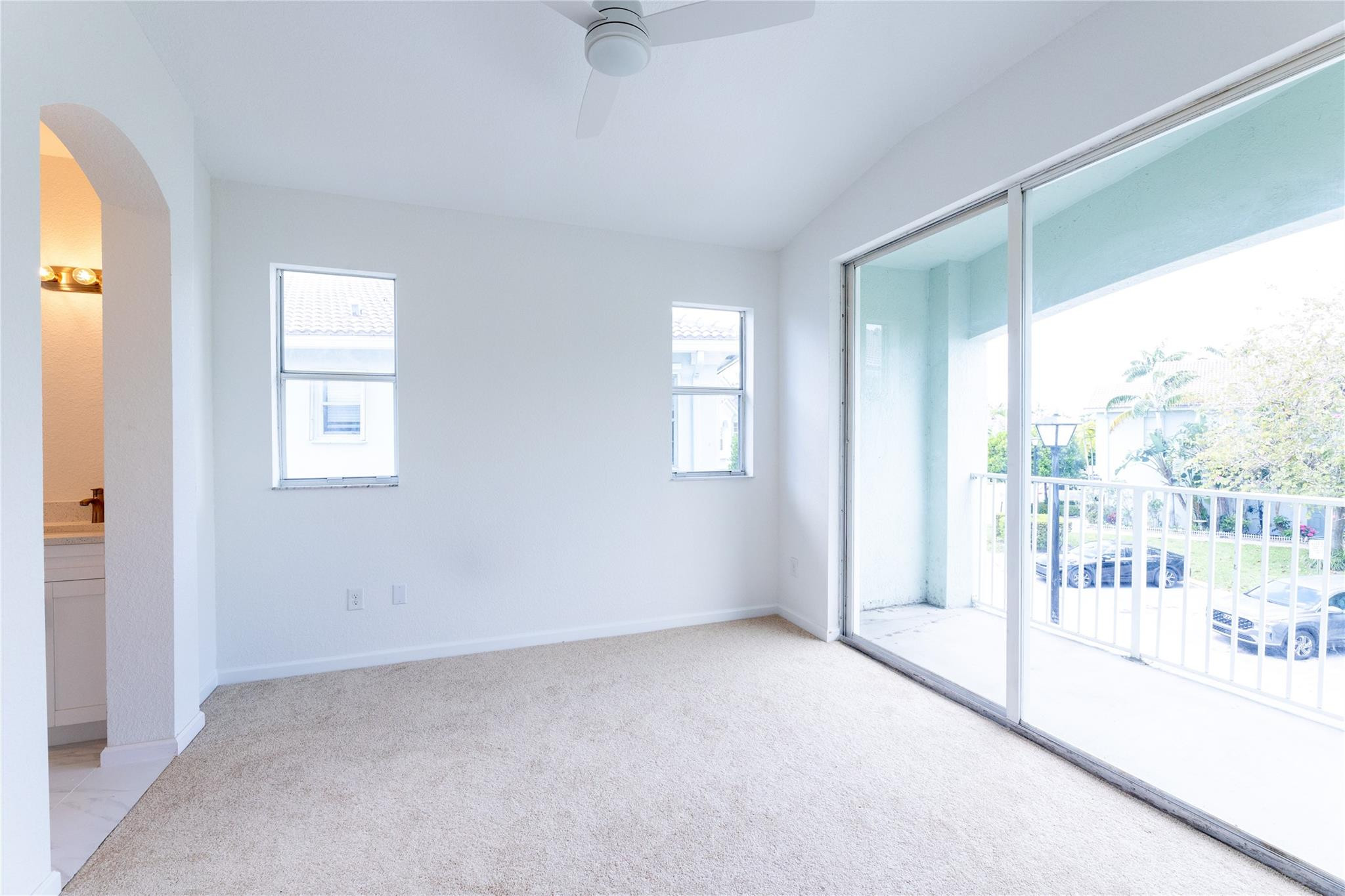 3199 Laurel Ridge Circle, Unit 3199 Riviera Beach, FL 33404 - Photo 8 of 44 a view of an empty room and a window