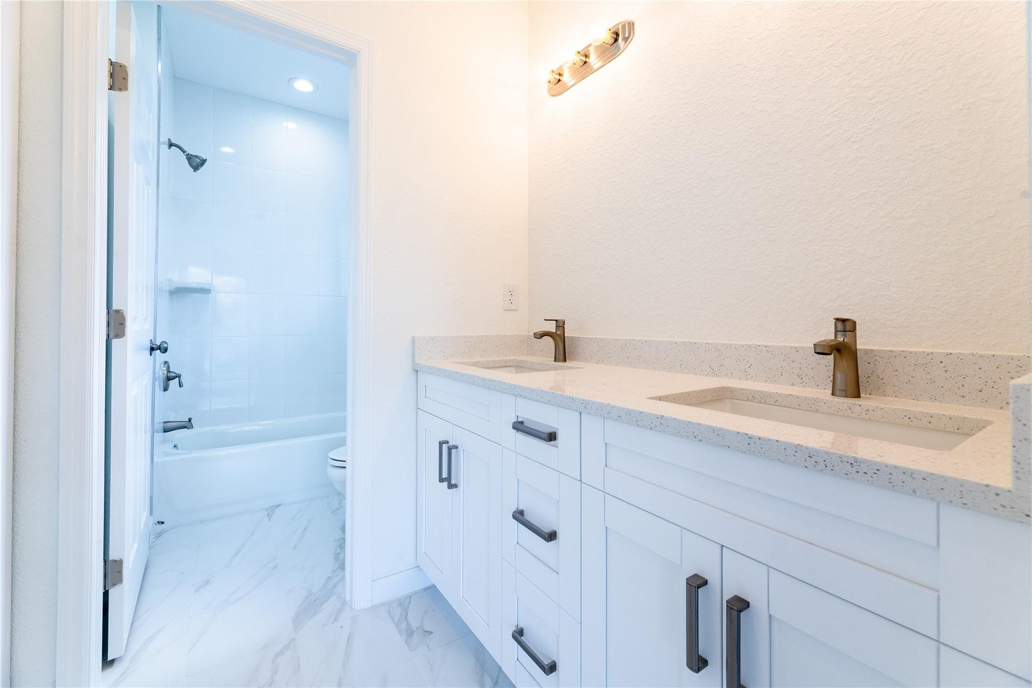 3199 Laurel Ridge Circle, Unit 3199 Riviera Beach, FL 33404 - Photo 10 of 44 a bathroom with a sink and a mirror
