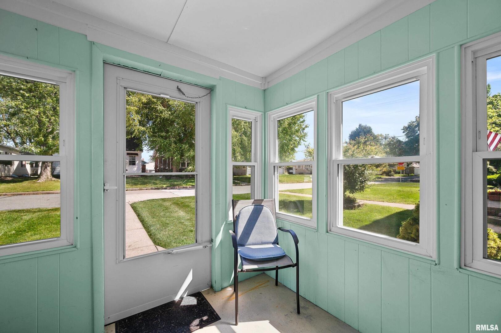 2375 31st Street, Unit A Moline, IL 61265 - Photo 3 of 26 a room with furniture and windows