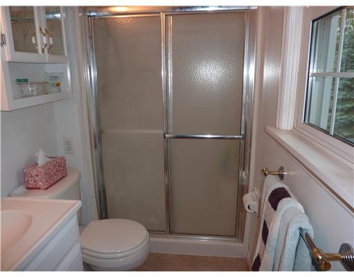 211 Lytton Road Coraopolis, PA 15108 - Photo 12 of 18 Master Bath/Spa. YOUR ESCAPE IS THIS BATH WITH CERAMIC TILE FLOOR, LARGE SHOWER, VANITY SINK AND WINDOW.