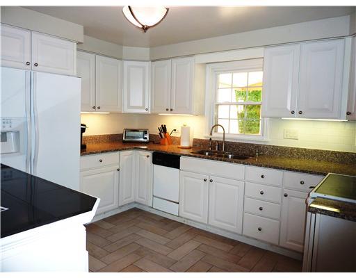 211 Lytton Road Coraopolis, PA 15108 - Photo 3 of 18 Kitchen. THIS COOKS DELIGHT OFFERS GRANITE COUNTER TOPS, IS FULLY EQUIPPED AND HAS A CERAMIC TILE BACKSPLASH AND FLOOR.