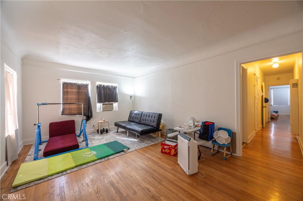 908 Summit Drive South Pasadena, CA 91030 - Photo 12 of 18 a living room with furniture and wooden floor