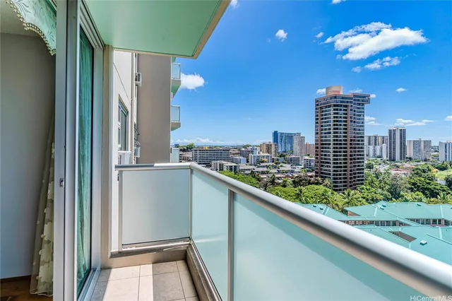 a view of balcony with a potted plant