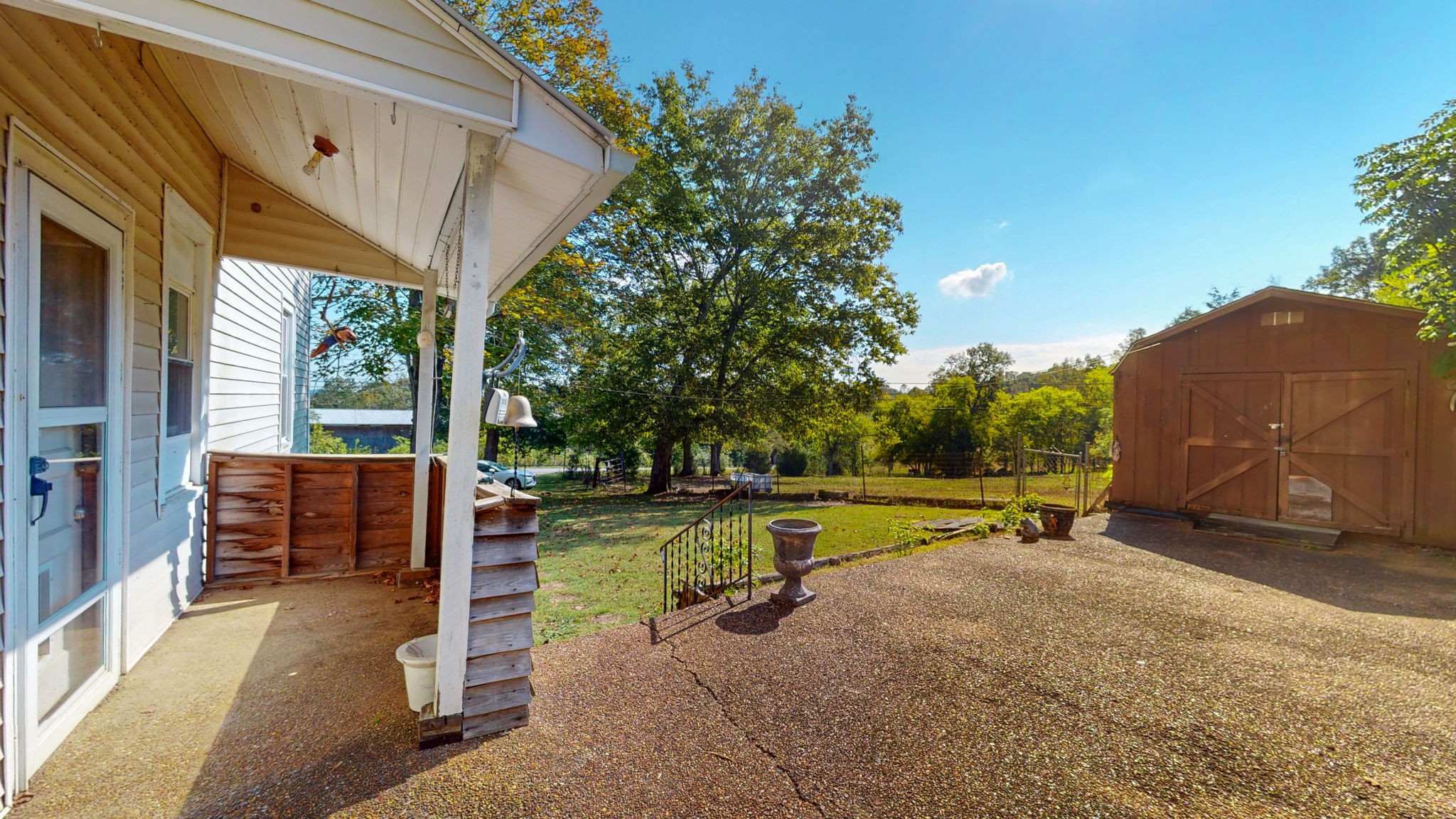710 Canoe Branch Road Lebanon, TN 37087 - Photo 47 of 65 a view of a porch with furniture and a yard