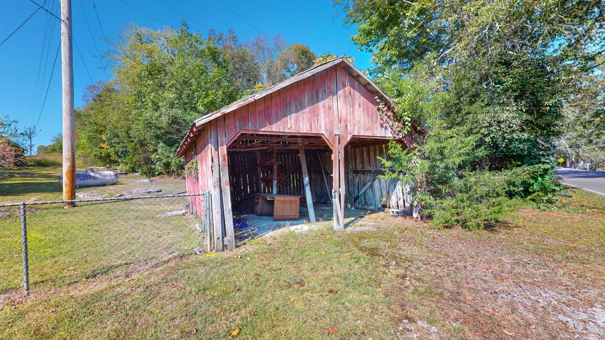 710 Canoe Branch Road Lebanon, TN 37087 - Photo 50 of 65 a view of a house with backyard and trees