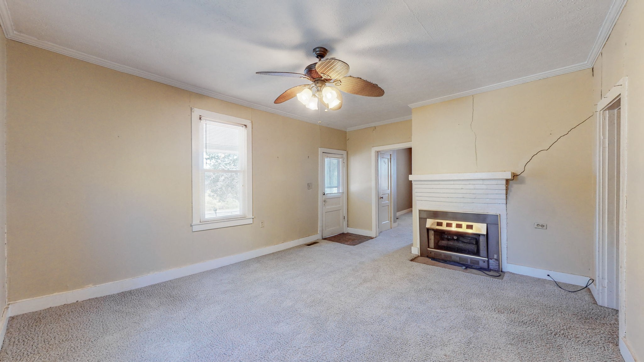 710 Canoe Branch Road Lebanon, TN 37087 - Photo 7 of 65 a view of an empty room with window and fireplace