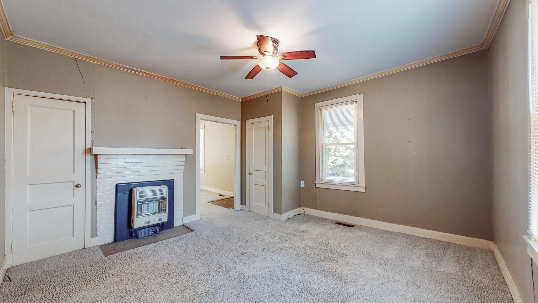 710 Canoe Branch Road Lebanon, TN 37087 - Photo 9 of 65 a view of empty room with fireplace and fan